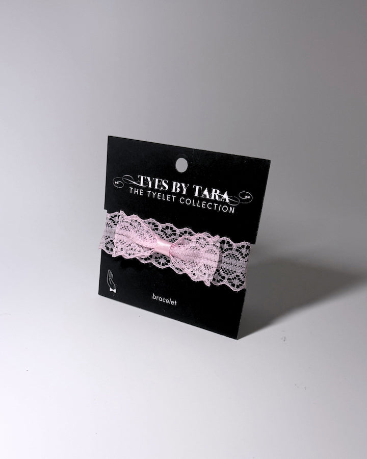 Siren Pink Bow Lace Bracelet on light gray background