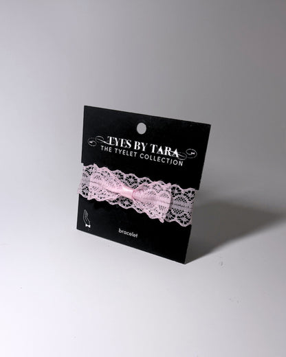 Siren Pink Bow Lace Bracelet on light gray background