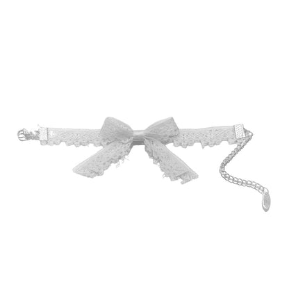 white lace bow bracelet flatlay on white background