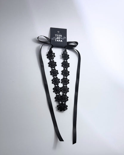 Blossom Black Flower Headband with Satin ties packaging view