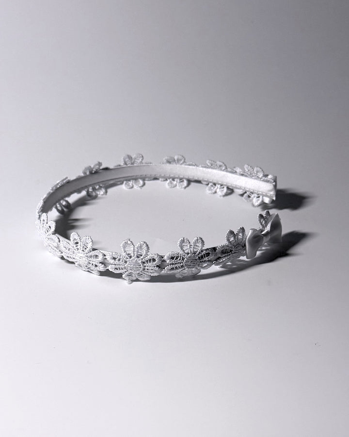 White Flower Headband Side View with Satin Bows