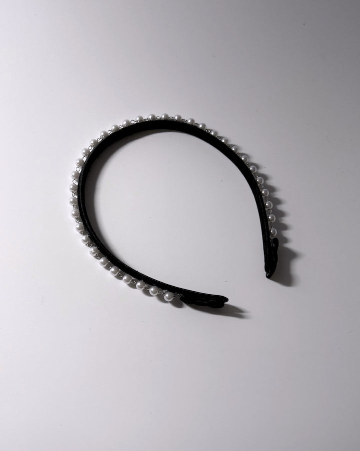 Centerfold Pearl Black Headband with bows at the tips of the hair headband