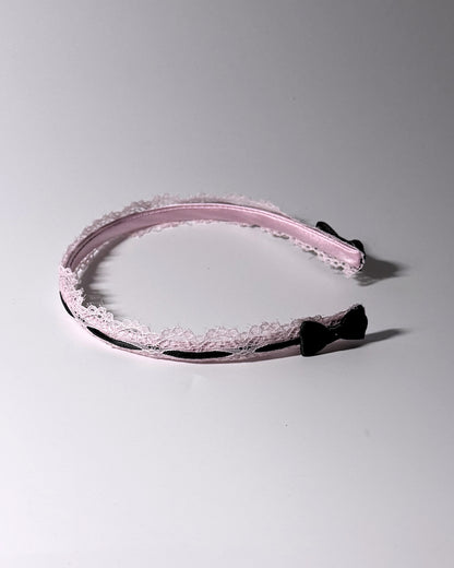 Pink Lace Headband Side View showing black bows