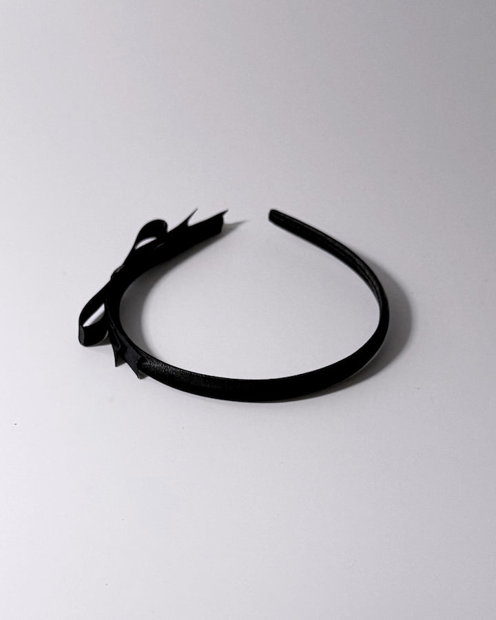 Top View of Enchantress Black Bow Headband