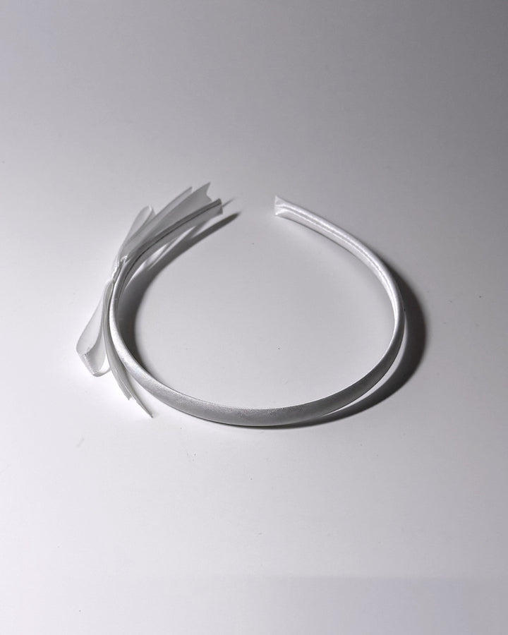 Enchantress White Satin Bow Headband on top view