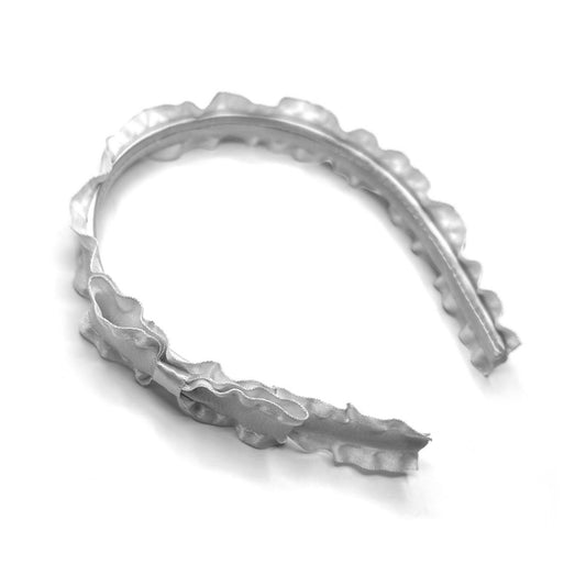white ruffled headband on white background