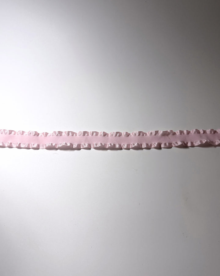 Pink Ruffled Headband with long pink satin ties flatlay