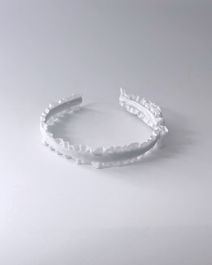 maiden white ruffled headband top view
