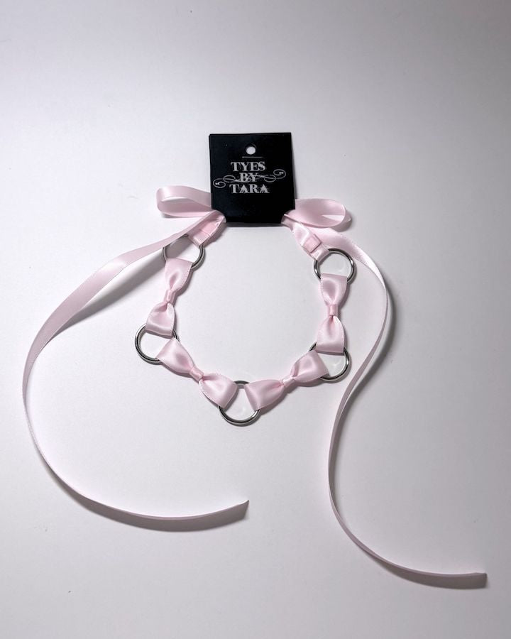 Pink Bow Headband with Silver O Rings and long satin ties with retail tag attached