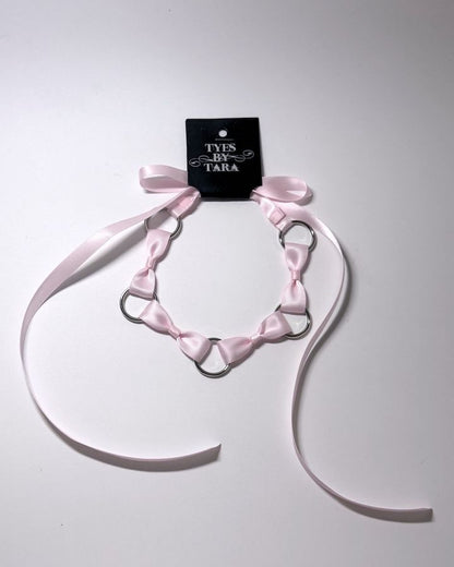 Pink Bow Headband with Silver O Rings and long satin ties with retail tag attached