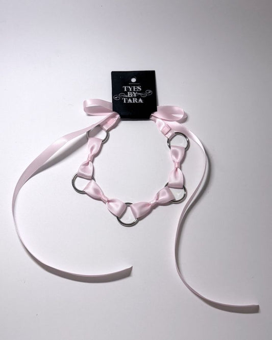 Pink Bow Headband with Silver O Rings and long satin ties with retail tag attached