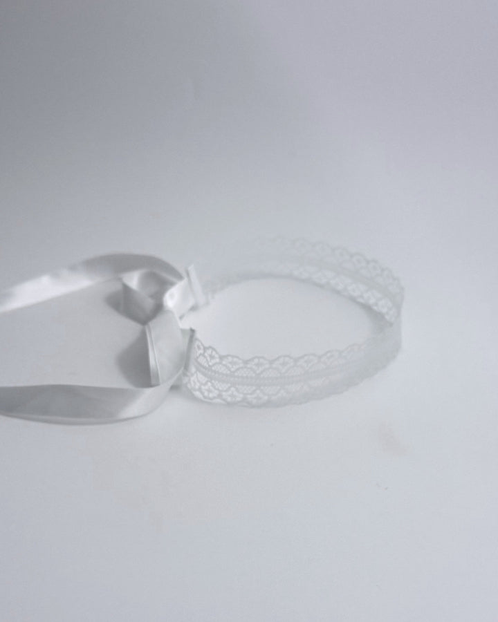 White lace headband side view