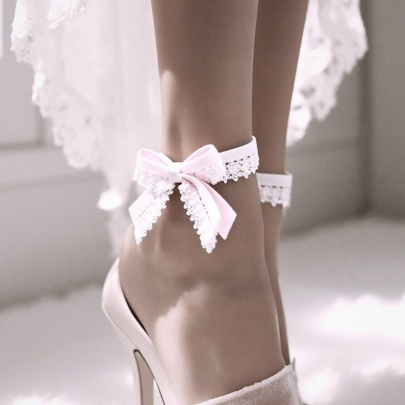 Belle White Bow Anklet on model in long white dress