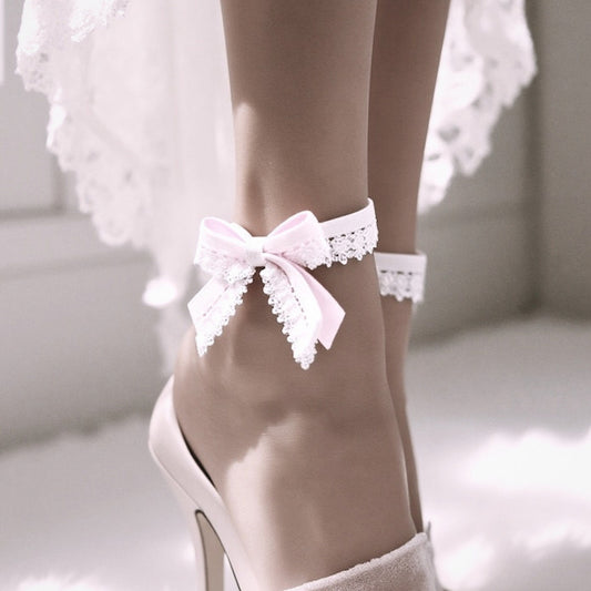 Belle White Bow Anklet on model in long white dress