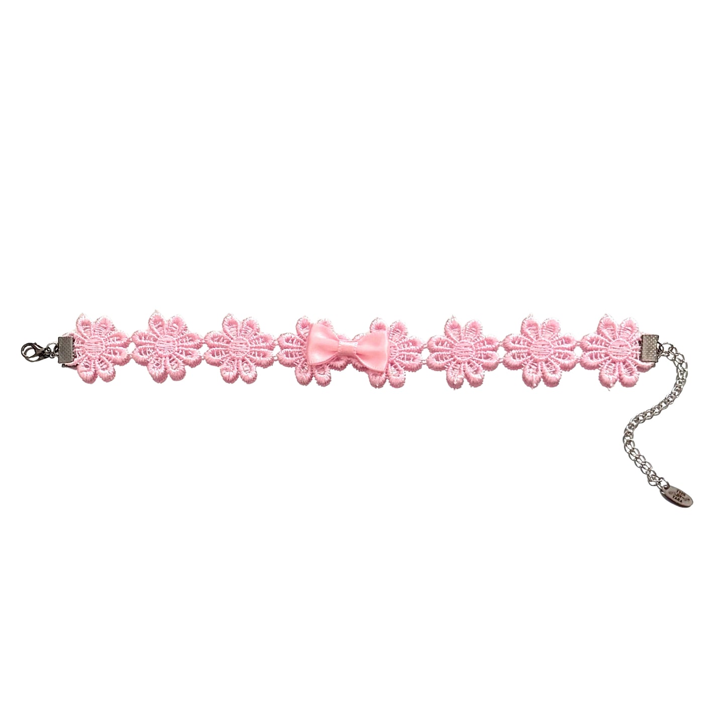 flat lay view of blossom pink flower anklet