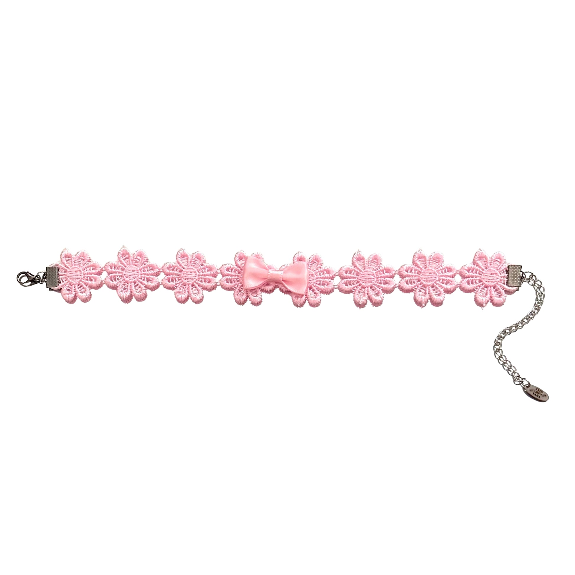 flat lay view of blossom pink flower anklet