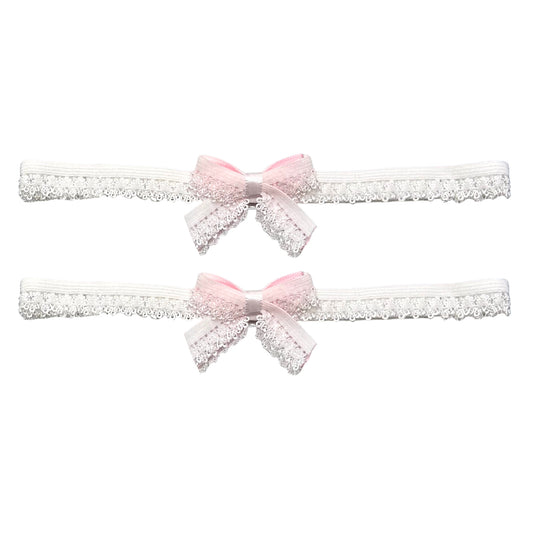 belle white bow leg garters on white background 