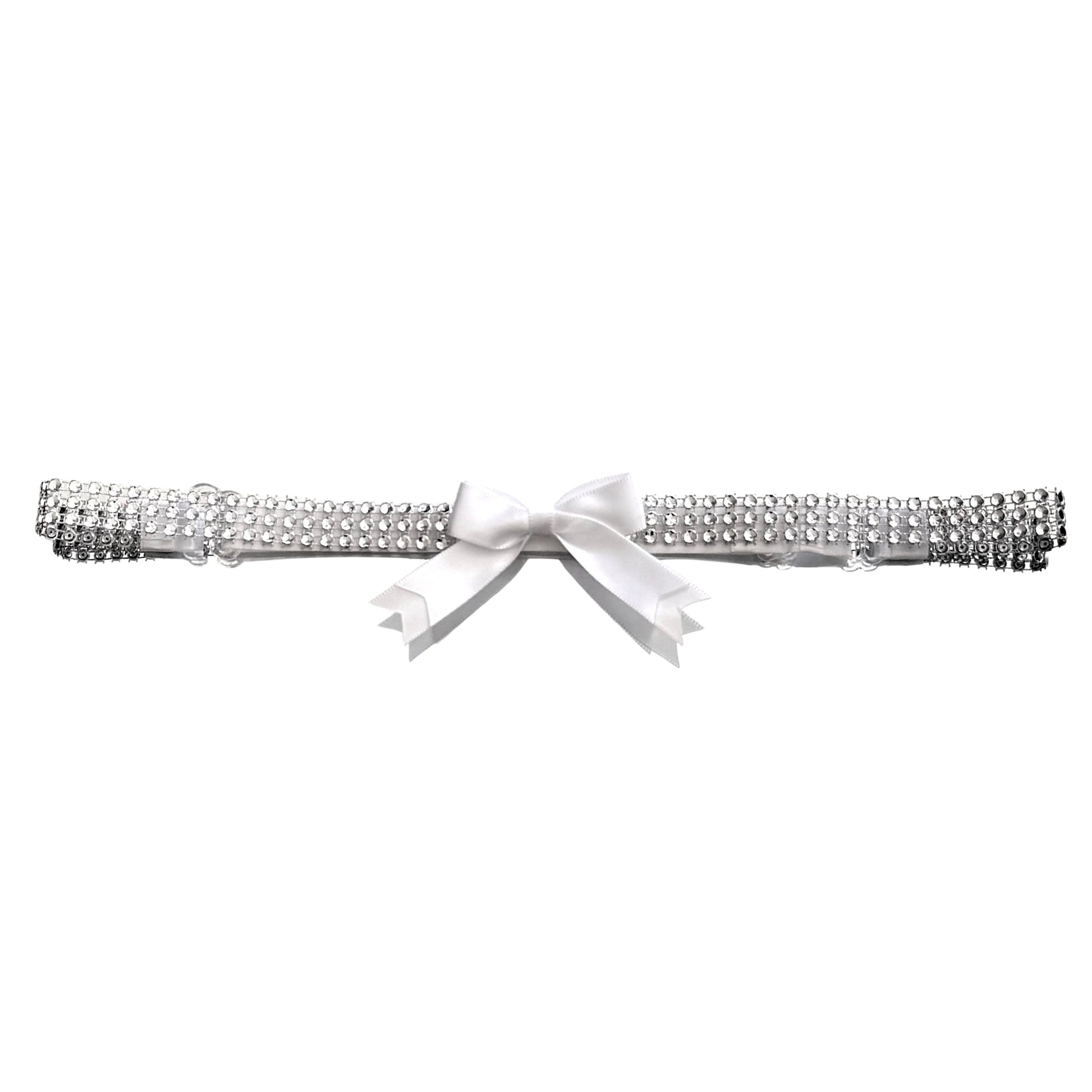 Silver sparkly belt with a white bow on a white background