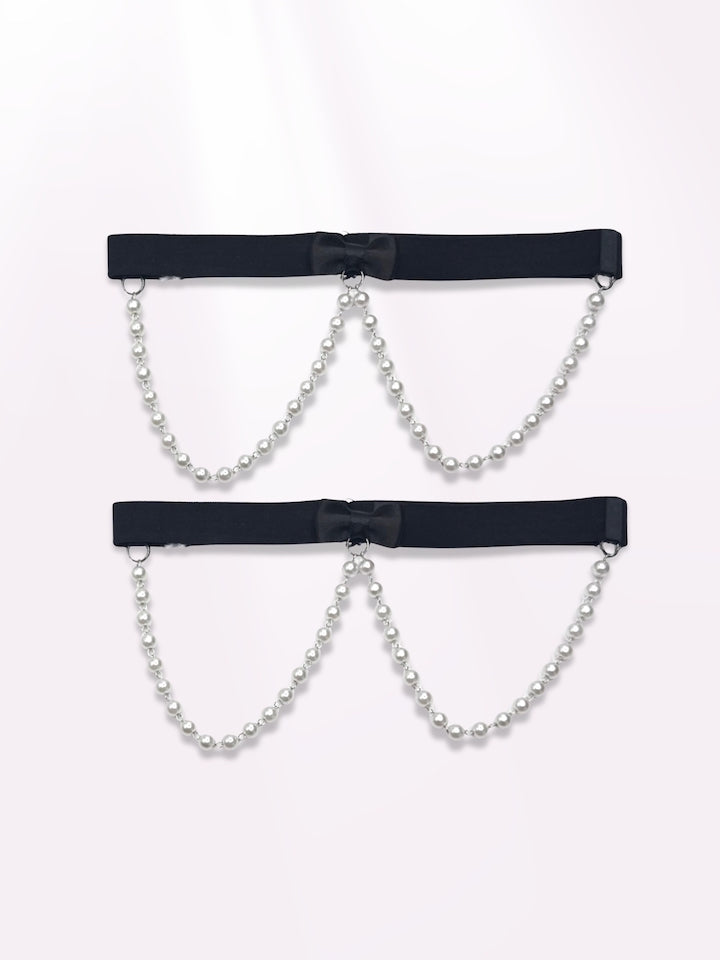 Black Pearl Bow Leg Garters on Light Pink Background