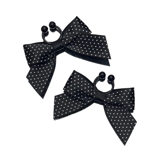 black pinup bow nipple clamps on white background