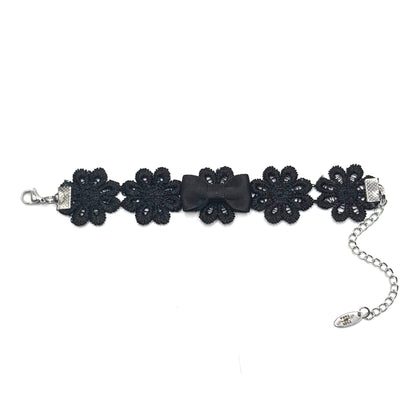 Flat View of Blossom Black Bow Bracelet