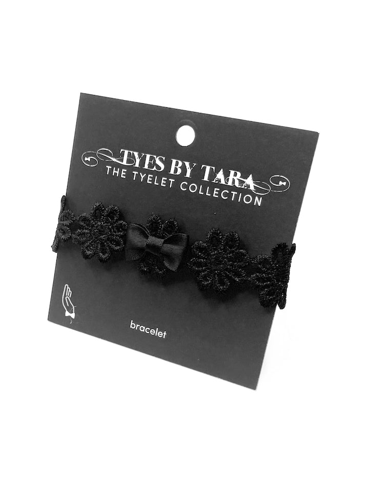 blossom black flower bow bracelet on black card
