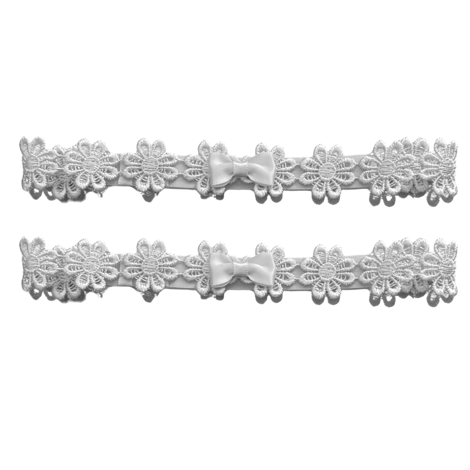 white flower leg garters with satin bow on white background