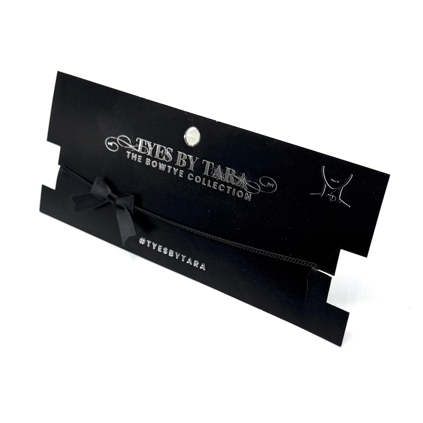 Black packaging with 'Tyes by Tara' branding on a white background