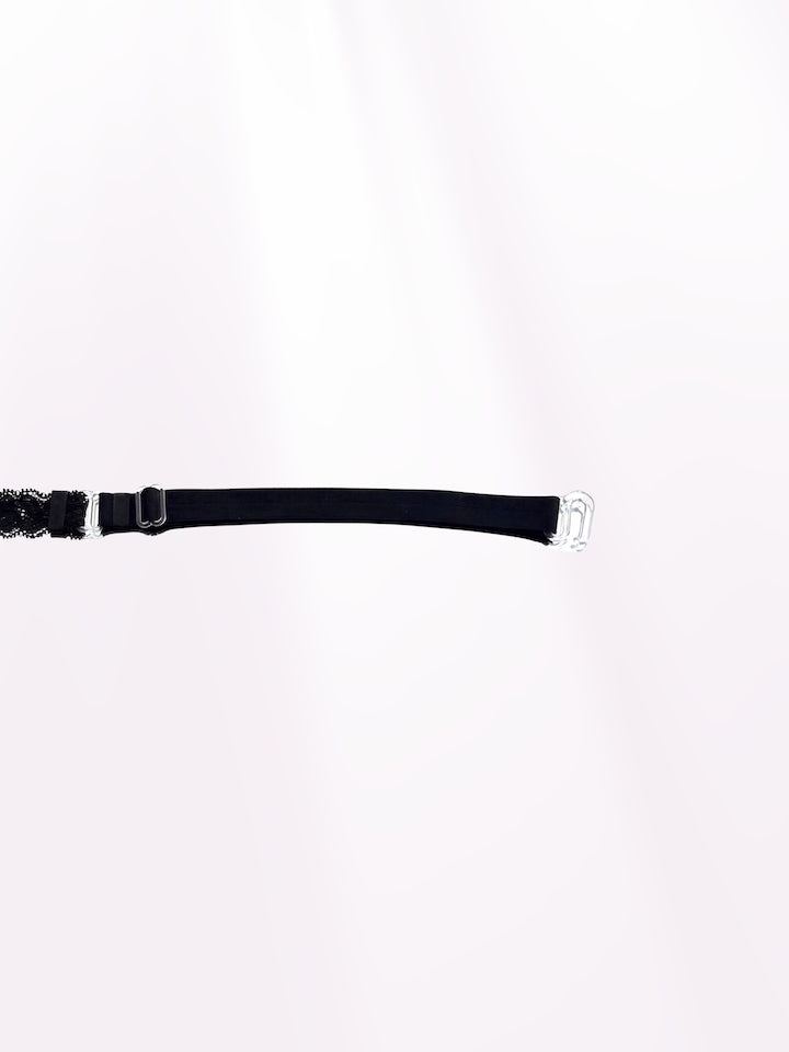 Bougee Bold Black Lace Bow Belt on Light Pink Background showing extender adjustable strap