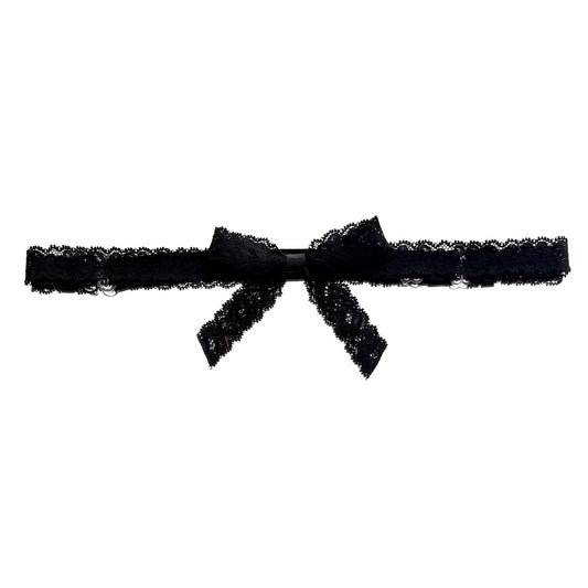 Black lace bow belt on white background