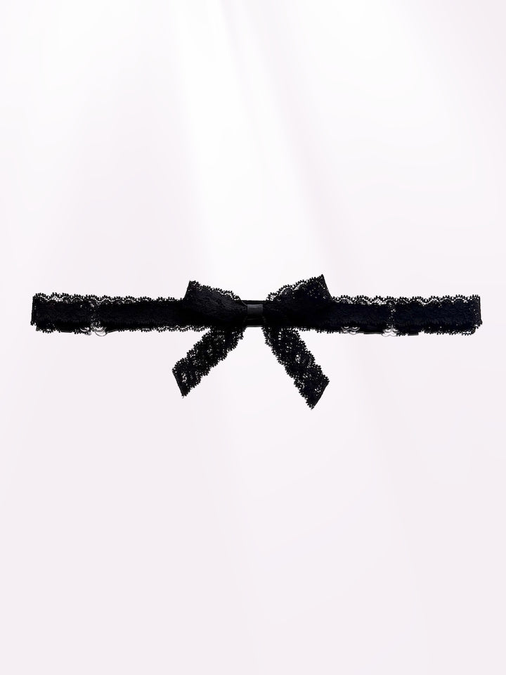 Bougee Bold Black Lace Bow Belt on Light Pink Background