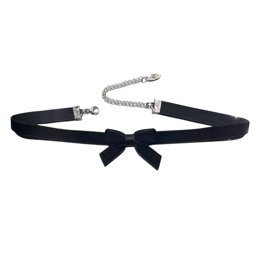 Black velvet bow choker with bow and chain on a white background