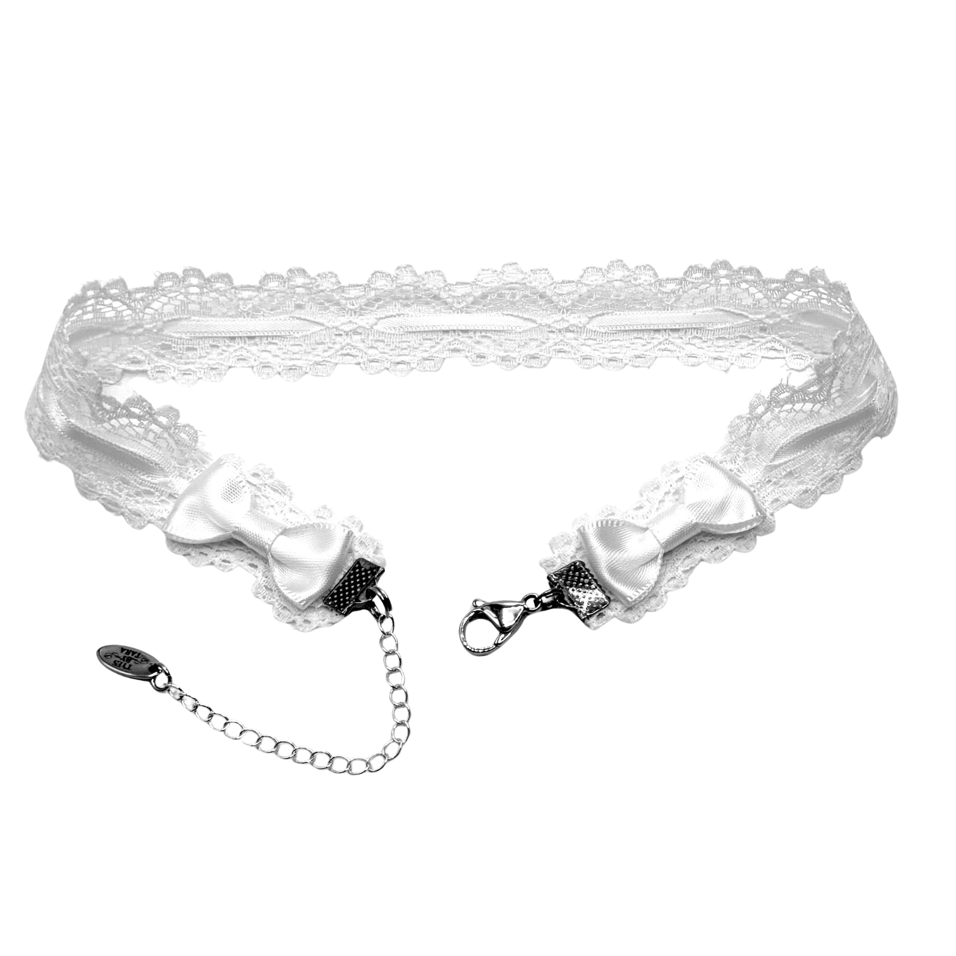 White lace choker with bow and chain on a white background
