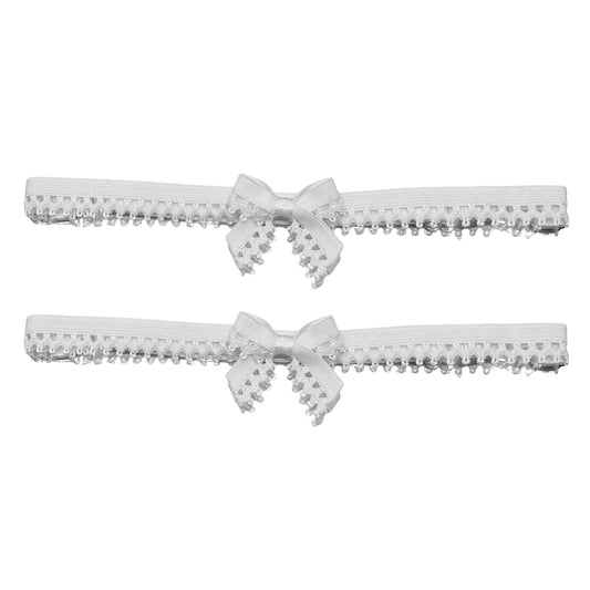 foxy white bow leg garters on white background
