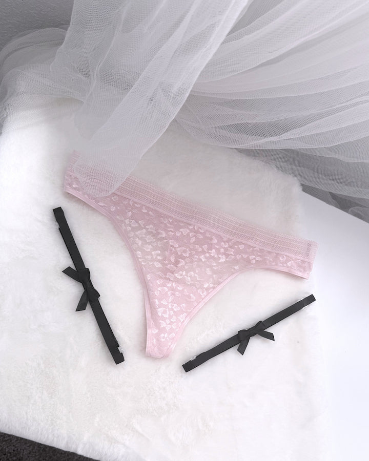 kinkette black bow leg garters with light pink lingerie