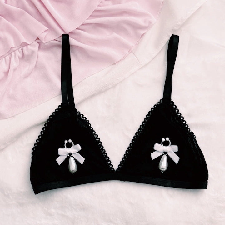 white velvet bow nipple clamps on black bra