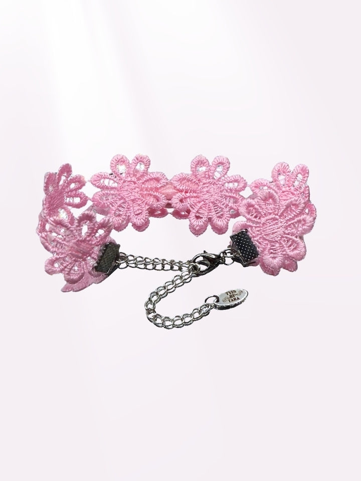 back view of light pink bow flower bracelet
