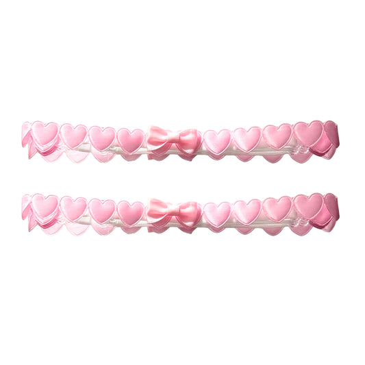 Two Pink Heart Leg Garters with Adjustable White Straps on White Background