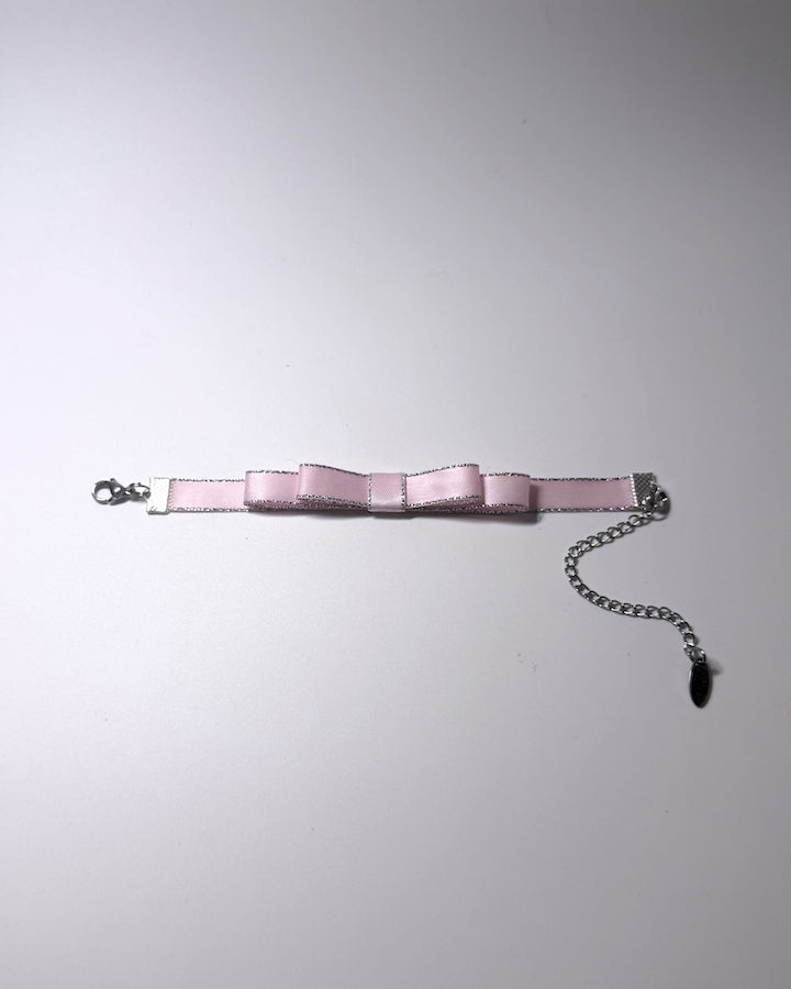 Pink Queen Bow Bracelet with Silver Metallic Trim flatlay