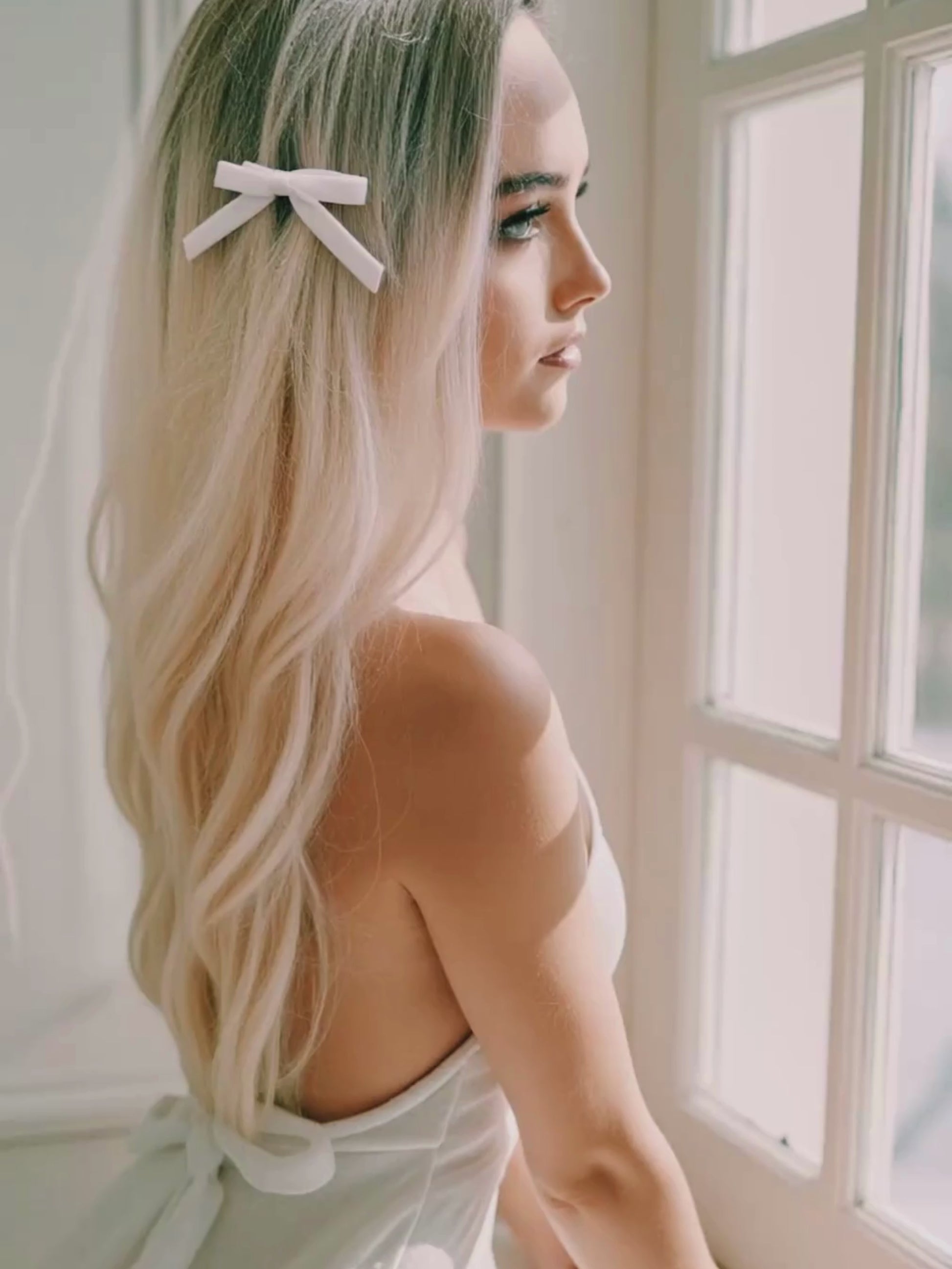 Model in White Marie Antoinette Hair Bow