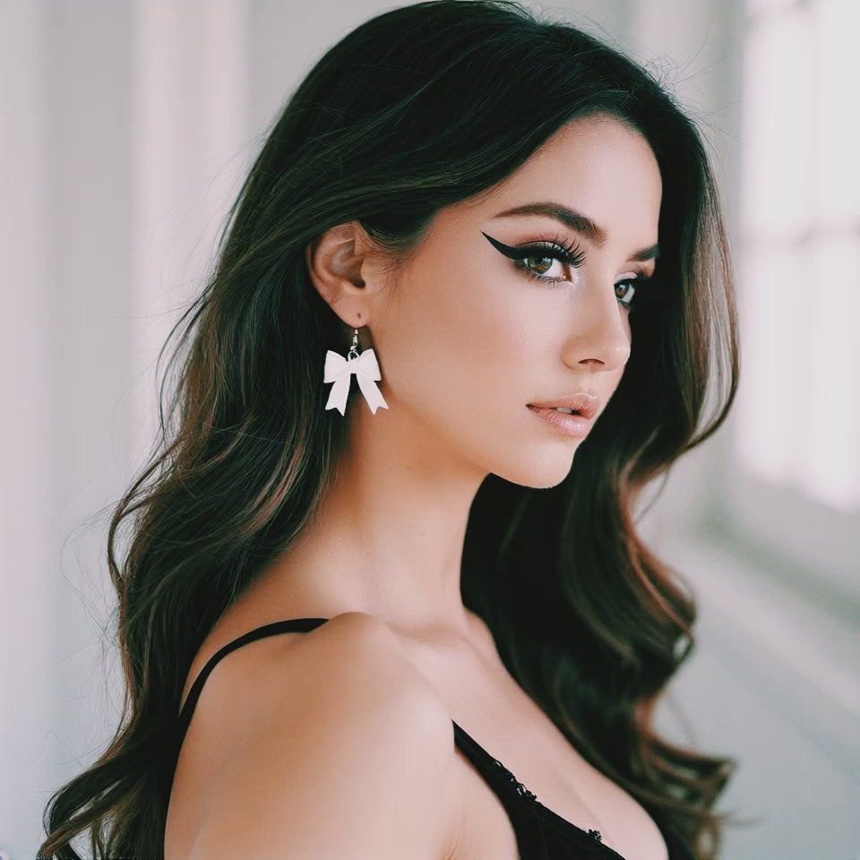 Brunette Model in White Bow Earrings