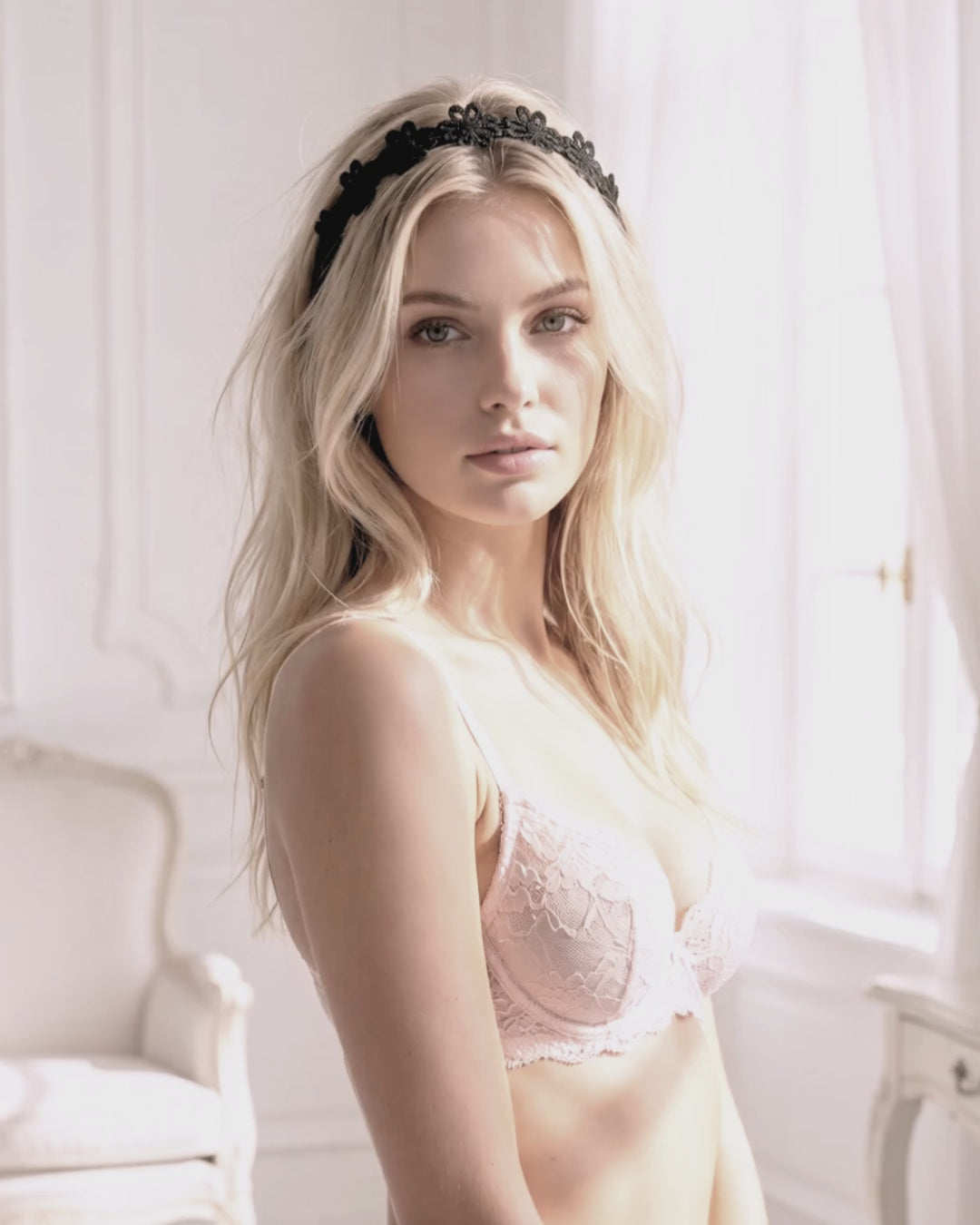 Blonde model in lingerie wearing the Black Flower Bow Headband in an elegant white boudoir
