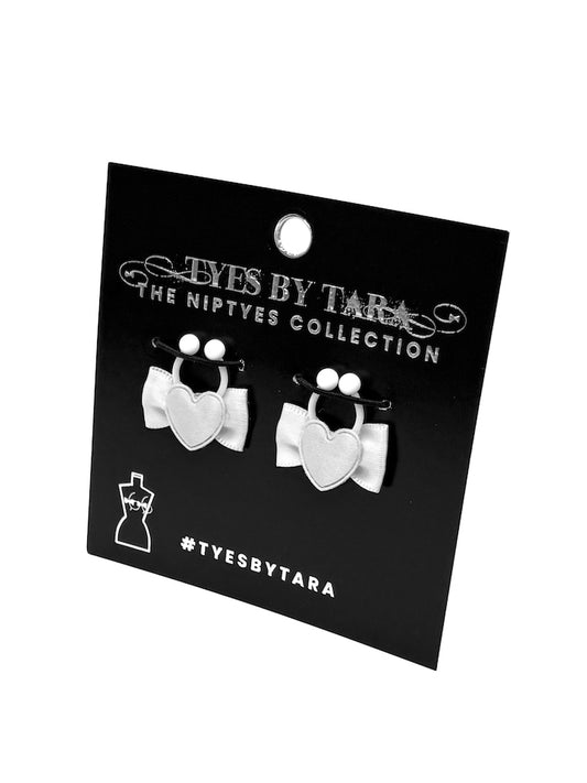 sweetheart bow heart nipple clamps packaging view on black card