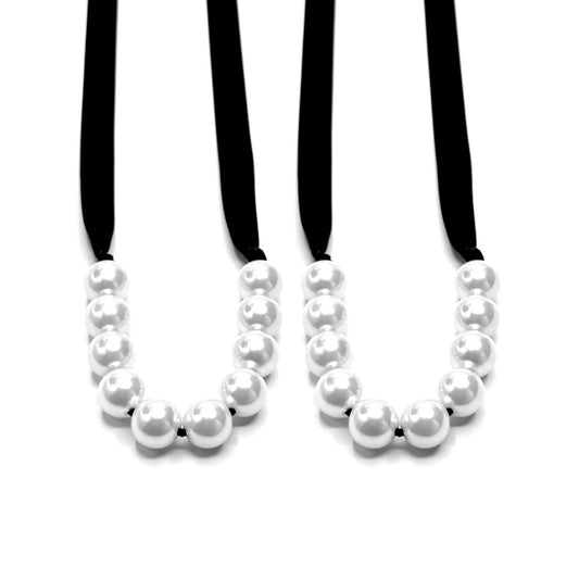mademoiselle pearl handcuffs with black satin tyes