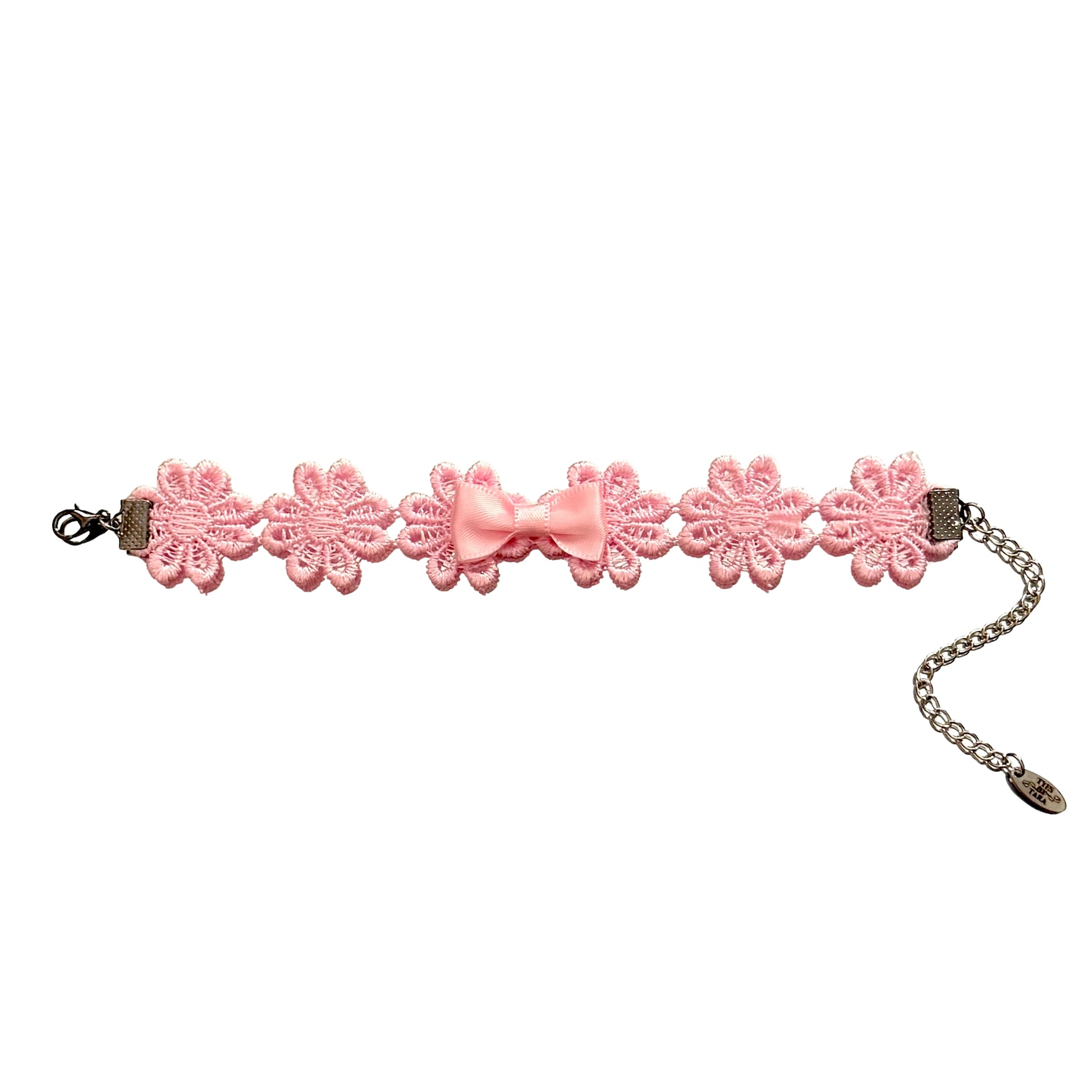 flatlay of blossom pink flower bracelet