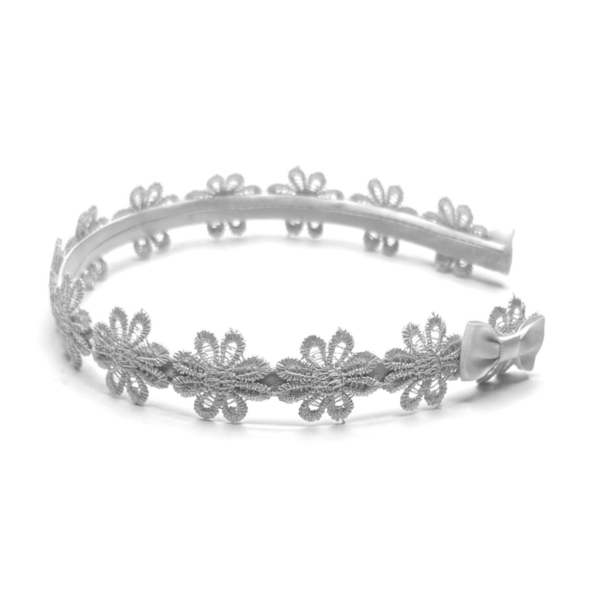 White Flower Headband on White Background side view showing bow on side