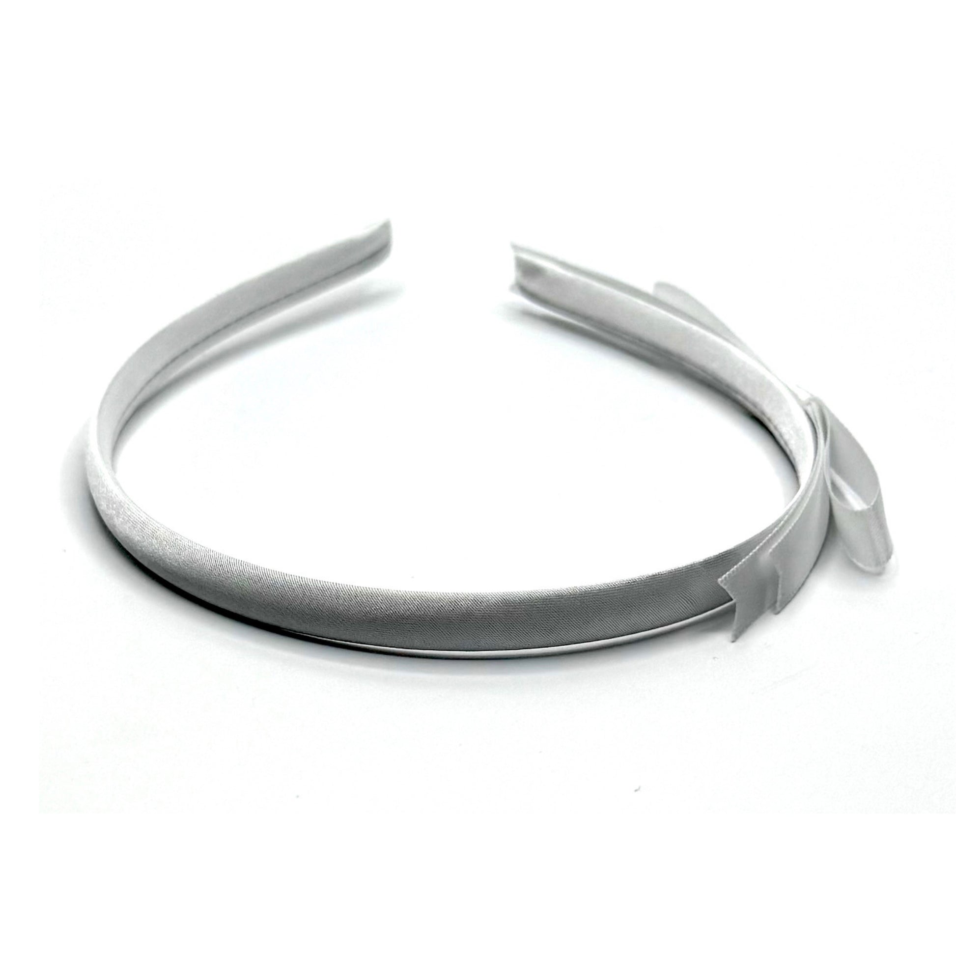 top view of white satin bow headband
