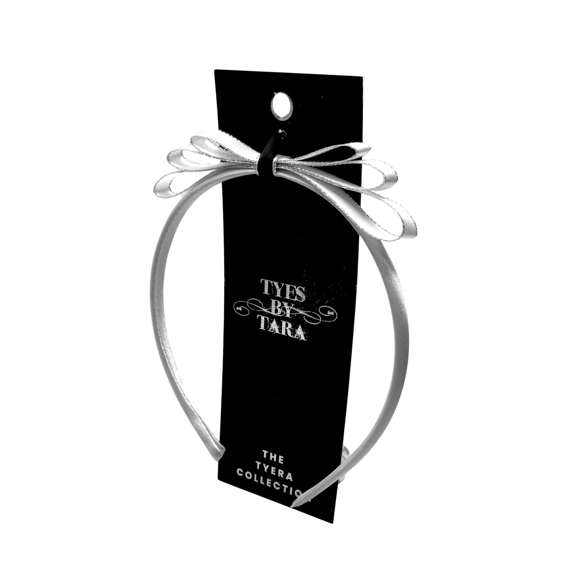 White Satin Bow Headband with Silver Metallic Trim Packaging View