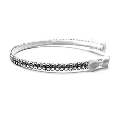 White Sparkly Headband with White and Silver Rhinestone Metsh with White Bows on the ends on a White Background Side View