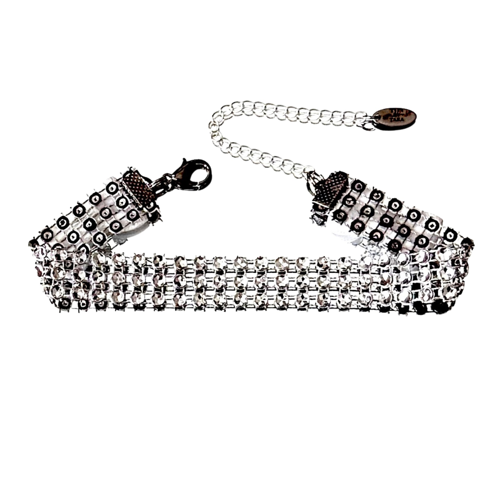 sparkly white bow anklet on white background
